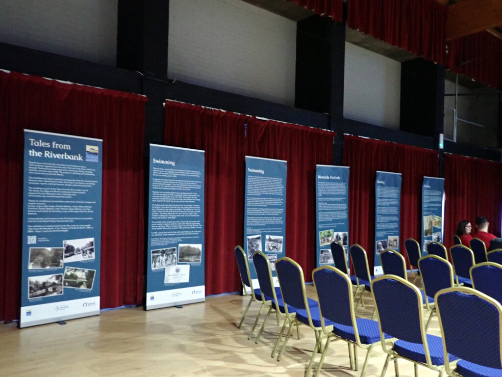 Six pop-up exhibition panels in a row