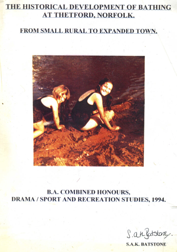 Cover of thesis with title info and photo of the author and a friend aged about 10