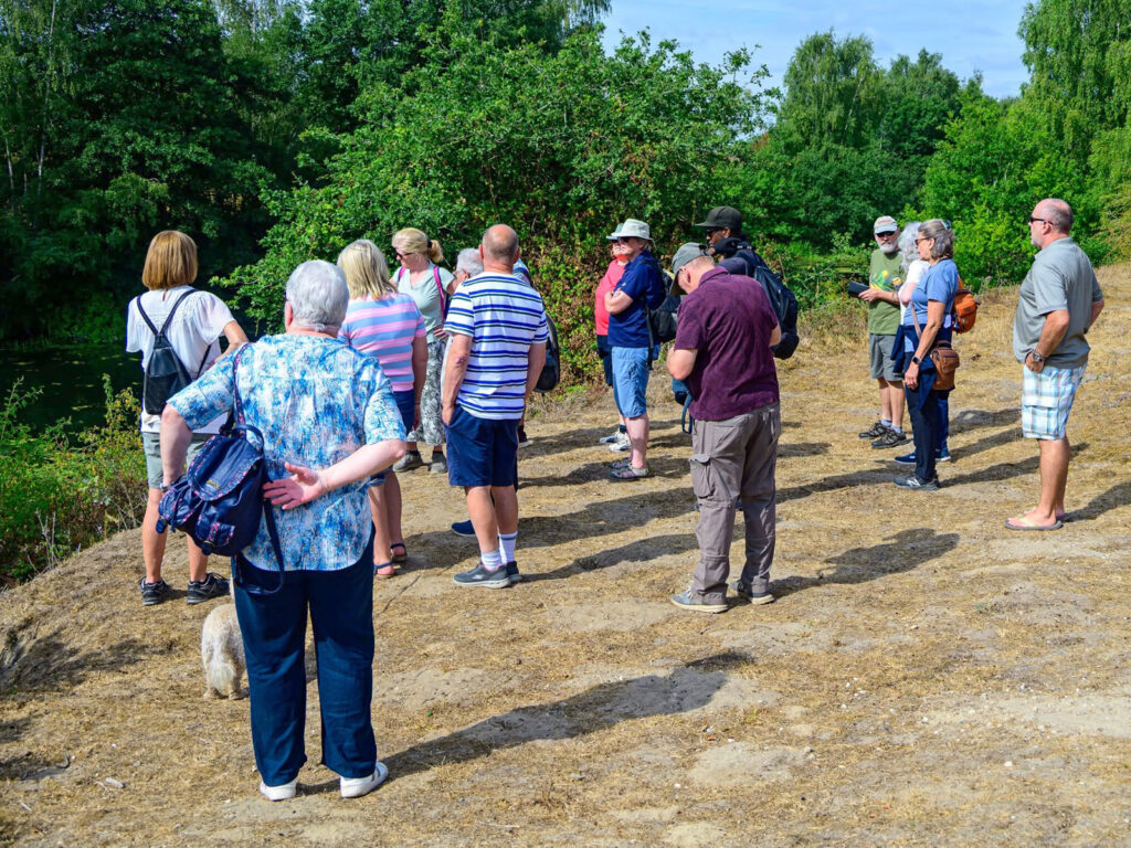walkers at Stoke Ferry Common looking at the Cut Off Channel
