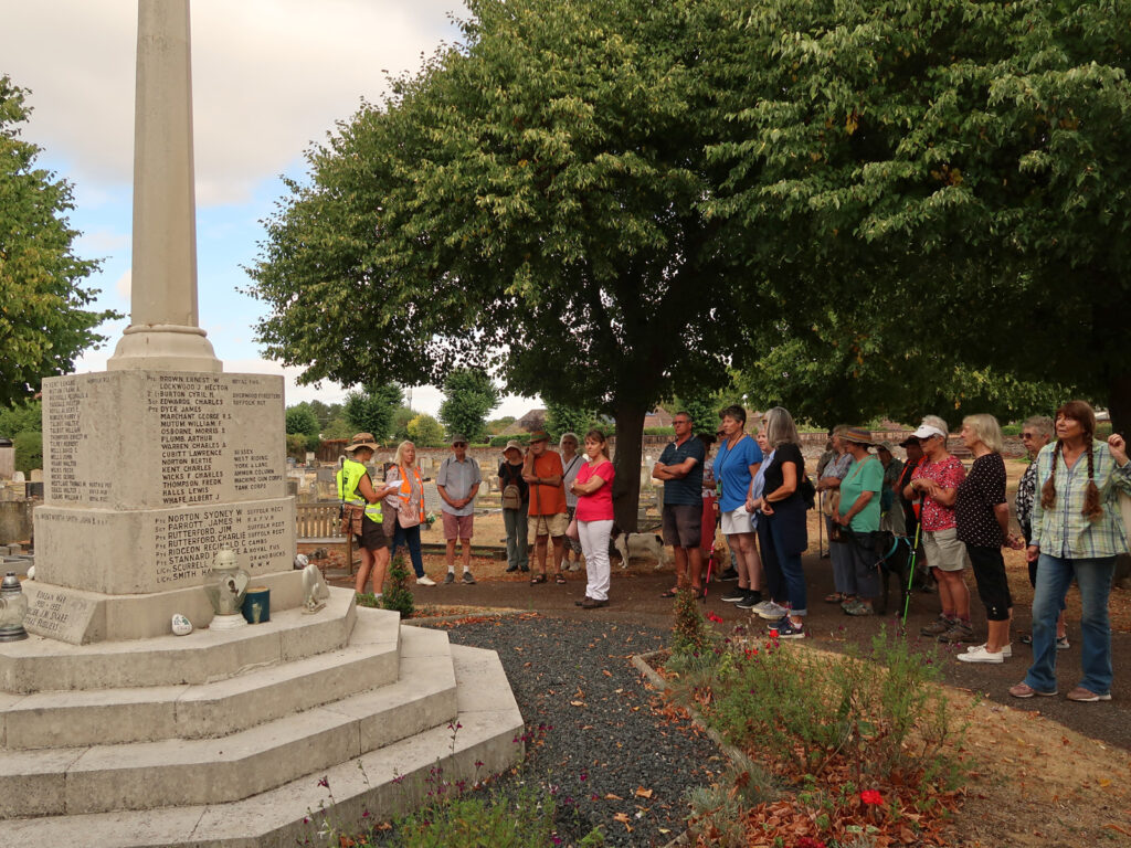 walkers listening to talk at Brandon War Memorial